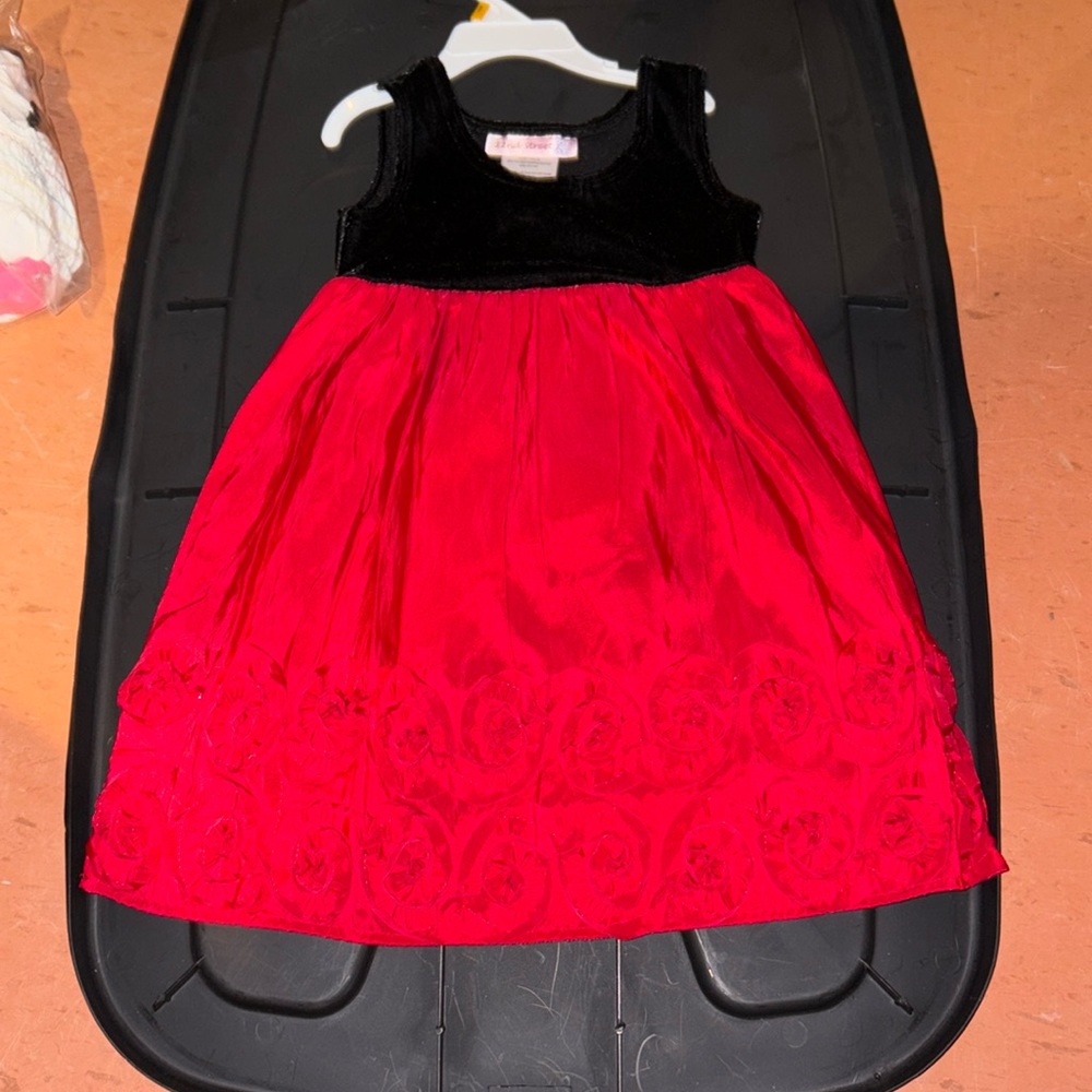 Nice holiday dress with Flowers’s at the bott